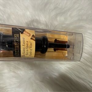 Cork pops Wine Opener